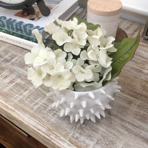 Vase with fake flowers